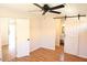 Bedroom with hardwood floors and ceiling fan at 513 W Melrose Dr, Casa Grande, AZ 85122