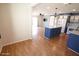 Bright dining area with hardwood floors and kitchen views at 513 W Melrose Dr, Casa Grande, AZ 85122