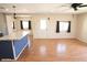 Bright living room featuring hardwood floors and sliding glass doors at 513 W Melrose Dr, Casa Grande, AZ 85122