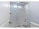 Clean bathroom with a shower/tub combo and glass enclosure at 5415 W Pontiac Dr, Glendale, AZ 85308