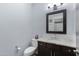 Modern bathroom with granite vanity and white tile at 5415 W Pontiac Dr, Glendale, AZ 85308