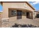 House entrance with decorative metal doors at 5415 W Pontiac Dr, Glendale, AZ 85308