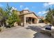 Two-story house with a courtyard and stone accents at 5415 W Pontiac Dr, Glendale, AZ 85308