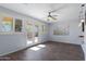 Living room with hardwood floors, sliding doors, and a view at 5415 W Pontiac Dr, Glendale, AZ 85308