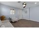 Light and airy living room with hardwood floors and a ceiling fan at 5415 W Pontiac Dr, Glendale, AZ 85308