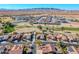 Aerial view of a golf course community with numerous houses at 5500 N Globe Dr, Eloy, AZ 85131