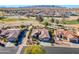 Community view showcasing homes, golf course, and desert landscape at 5500 N Globe Dr, Eloy, AZ 85131