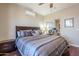 Spacious bedroom with king-size bed and mirrored closet doors at 5500 N Globe Dr, Eloy, AZ 85131