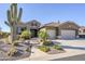 Beautiful desert landscape with a two-car garage home at 5500 N Globe Dr, Eloy, AZ 85131