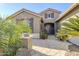 Inviting front entry with decorative landscaping and tile at 5500 N Globe Dr, Eloy, AZ 85131