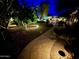 Landscaped backyard pathway at night at 5500 N Globe Dr, Eloy, AZ 85131