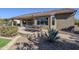 Spacious backyard patio with seating area and built-in BBQ at 5500 N Globe Dr, Eloy, AZ 85131