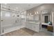 Modern bathroom with double vanity and large walk-in shower at 744 E Desert Ln, Phoenix, AZ 85042