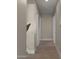 Bright hallway with wood flooring and neutral walls at 744 E Desert Ln, Phoenix, AZ 85042