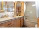 Clean bathroom with bathtub and updated vanity at 7807 E Main St # B-15, Mesa, AZ 85207