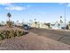 Mobile home community with paved roads and desert landscaping at 7807 E Main St # B-15, Mesa, AZ 85207