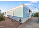 Side view of mobile home with satellite dish at 7807 E Main St # B-15, Mesa, AZ 85207