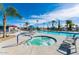 Community pool and spa with lounge chairs at 7807 E Main St # B-15, Mesa, AZ 85207