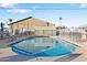 Smaller kidney-shaped community pool at 7807 E Main St # B-15, Mesa, AZ 85207