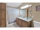 Bathroom with a tub, shower, vanity with granite countertop at 8500 E Southern Ave # 126, Mesa, AZ 85209