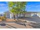 Single-story home with carport and landscaped yard at 8500 E Southern Ave # 506, Mesa, AZ 85209