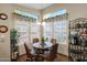 Cozy kitchen nook with a small table and four chairs at 8500 E Southern Ave # 506, Mesa, AZ 85209