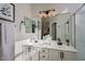 Bathroom boasts double vanity and updated fixtures at 8605 W Paradise Dr, Peoria, AZ 85345