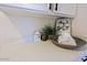 White quartz countertop with decorative bowl and towels at 8605 W Paradise Dr, Peoria, AZ 85345