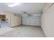 Two-car garage with built-in cabinets and ample storage at 8605 W Paradise Dr, Peoria, AZ 85345