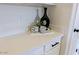 Kitchen counter with decorative items and a modern vase at 8605 W Paradise Dr, Peoria, AZ 85345