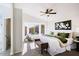 Spacious main bedroom with bay window and ceiling fan at 8605 W Paradise Dr, Peoria, AZ 85345