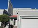 Close-up of townhouse entrance, showing architectural details and landscaping at 8719 N Fountain Dr, Peoria, AZ 85345