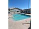 Community swimming pool with ample deck space for lounging at 8719 N Fountain Dr, Peoria, AZ 85345