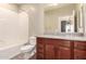 Bathroom features a shower/tub combo and granite countertop at 900 S Canal Dr # 224, Chandler, AZ 85225