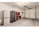 Garage with shelving, workbench, and ample storage at 900 S Canal Dr # 224, Chandler, AZ 85225