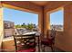 Private patio with table and chairs, offering a view at 900 S Canal Dr # 224, Chandler, AZ 85225