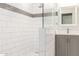 Modern bathroom with gray vanity and a large walk-in shower at 901 N Longmore St, Chandler, AZ 85224