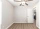 Light bedroom with wood-look floors and view of kitchen at 901 N Longmore St, Chandler, AZ 85224