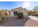 Single story home with a two-car garage and desert landscaping at 901 N Longmore St, Chandler, AZ 85224