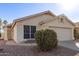 Single story home with a two-car garage and well-maintained landscaping at 901 N Longmore St, Chandler, AZ 85224