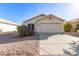 Front view of a single story home with a two-car garage at 901 N Longmore St, Chandler, AZ 85224