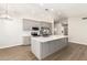 Kitchen island with white quartz countertop and gray cabinets at 901 N Longmore St, Chandler, AZ 85224