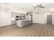 Modern kitchen with gray cabinets, island, and breakfast bar at 901 N Longmore St, Chandler, AZ 85224