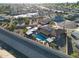 Aerial view showing home's pool, solar panels and surrounding neighborhood at 9101 W Willow Haven Ct, Sun City, AZ 85351