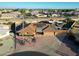 Aerial view showing home with solar panels and a large backyard at 9101 W Willow Haven Ct, Sun City, AZ 85351