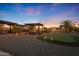 Large backyard with multiple patios and putting green at 9101 W Willow Haven Ct, Sun City, AZ 85351