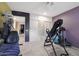 Home exercise room with various workout equipment at 9101 W Willow Haven Ct, Sun City, AZ 85351