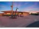 Single-story home with a large driveway at 9101 W Willow Haven Ct, Sun City, AZ 85351