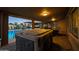 Relax in the covered patio hot tub near the pool at 9101 W Willow Haven Ct, Sun City, AZ 85351