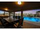 Backyard oasis with sparkling pool, hot tub, and covered patio at 9101 W Willow Haven Ct, Sun City, AZ 85351